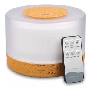 Aromatizador Umidificador Difusor De Ambientes 700ml Ultrassônico com Controle Remoto LED 7 Cores Base na cor Branca e Madeira Clara, escolha na hora da compra! Este difusor contribui para melhorar a qualidade de vida! Mais que um aromatizador, este aparelho também funciona como umidificador de ar e luminária com cromoterapia. Portátil, ele pode ser levado para onde quiser, desde que haja uma tomada para conectá-lo à energia, proporcionando bem-estar em diversos ambientes. Possui capacidade para 700ml de água, é elétrico, funciona ligado na tomada 110v ou 220v (Bivolt), não tem filtro de algodão e é adequado para utilizar essências ou óleos essenciais diluídos na água. Possui temporizador para programar o desligamento automático do aparelho. A luz pode ser desligada, deixando apenas o aromatizador.